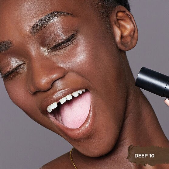 TINTED BLUR FOUNDATION STICK - DEEP 10